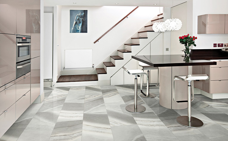 stone look luxury vinyl tile flooring in kitchen